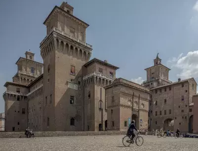 Ferrara castle with cyclist