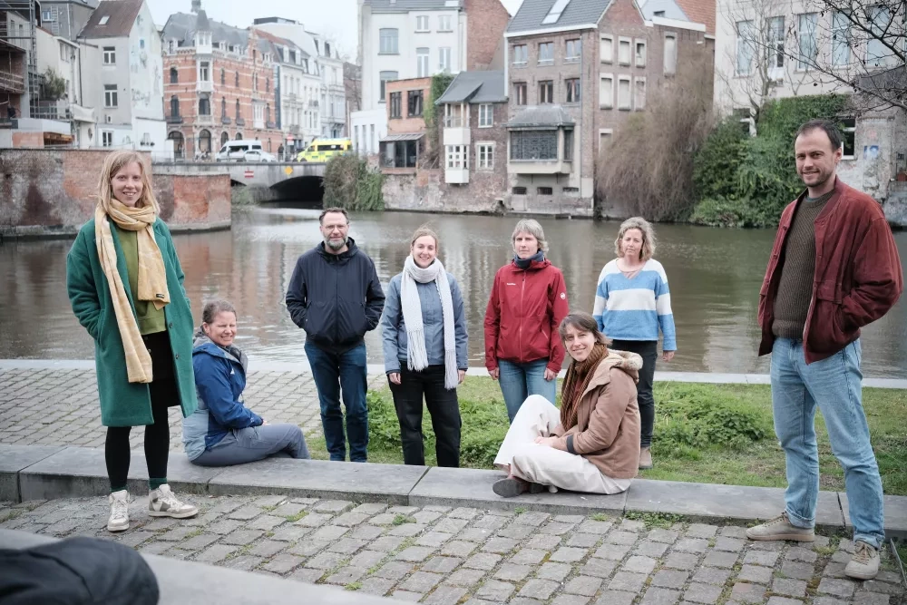 The REWILD Team standing at the water in Ghent