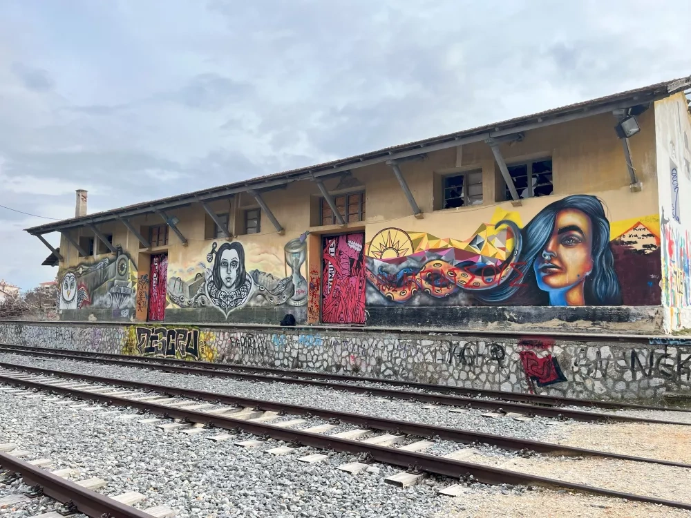 Old railway facilities in Kozani, currently covered in graffiti and murals, are planned to house a future hub for creativity and innovation