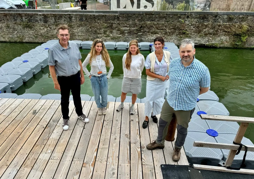 Pilot testing in action – from the left: Alderman Franky Demon, the Blue4Green team of Stad Brugge - Magalie Mahieu, Eva Gheselle, Astrid Stroobandt; Professor Peter Goethals.